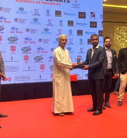 Receiving shield at Diplomats Networking 2023 from his legacy Sami A.Salim Consul General of Oman