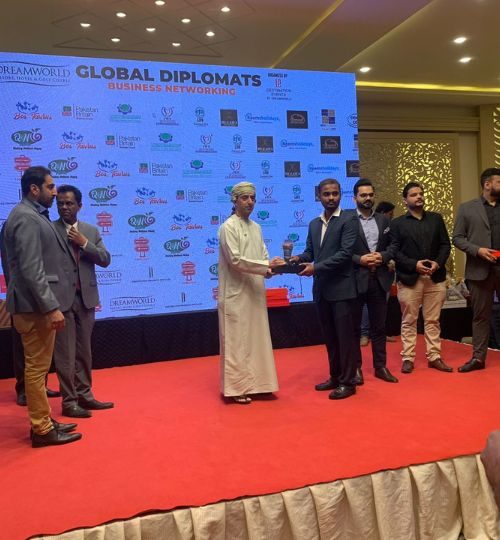 Receiving shield at Diplomats Networking 2023 from his legacy Sami A.Salim Consul General of Oman